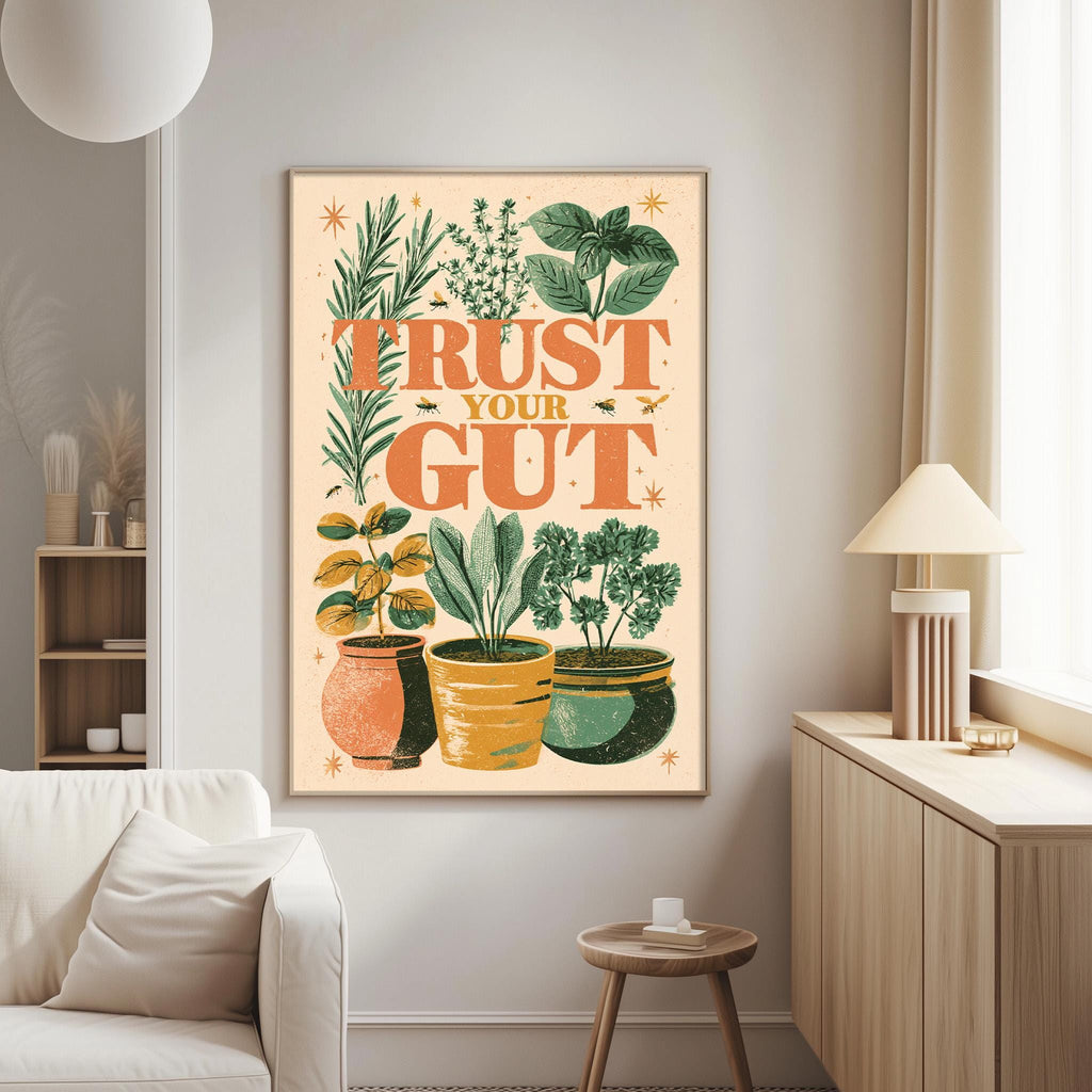 a living room with a large framed poster on the wall that says "Trust Your Gut" surrounded by various potted plants.