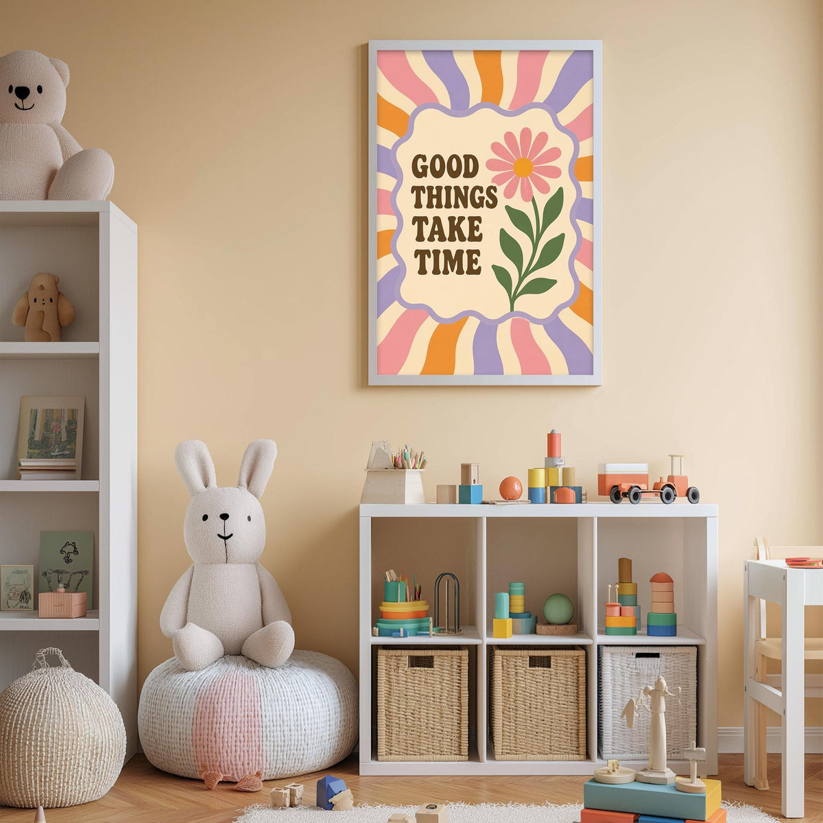 A child's bedroom with a white bookshelf, a stuffed rabbit, and a colorful poster on the wall. The poster has the text "GOOD THINGS TAKE TIME" and features a flower design.