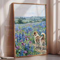 A large framed painting depicting a dog standing in a field of blue flowers, with a scenic landscape in the background.