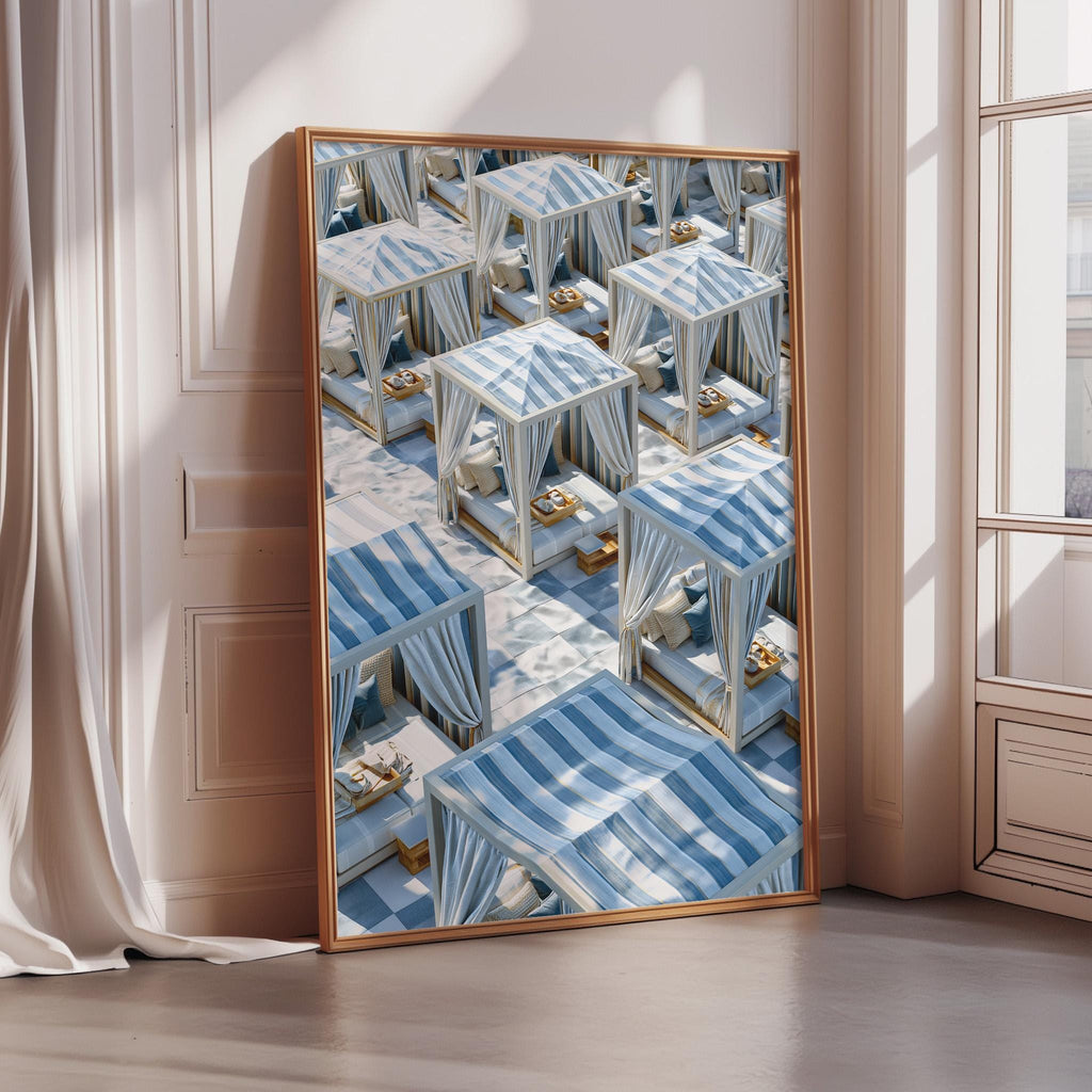 a large, framed picture of a beach-themed hotel room with multiple blue and white striped canopy beds arranged in a grid-like pattern.