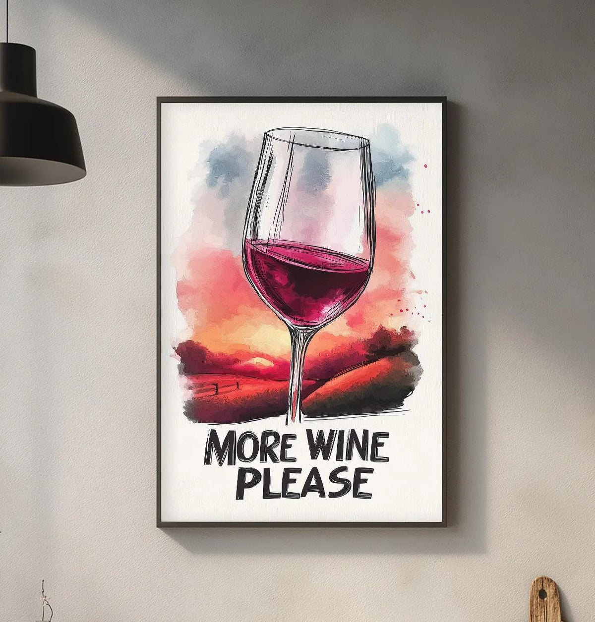 a framed poster with a wine glass and the text "MORE WINE PLEASE" hanging on a wall in a kitchen setting.