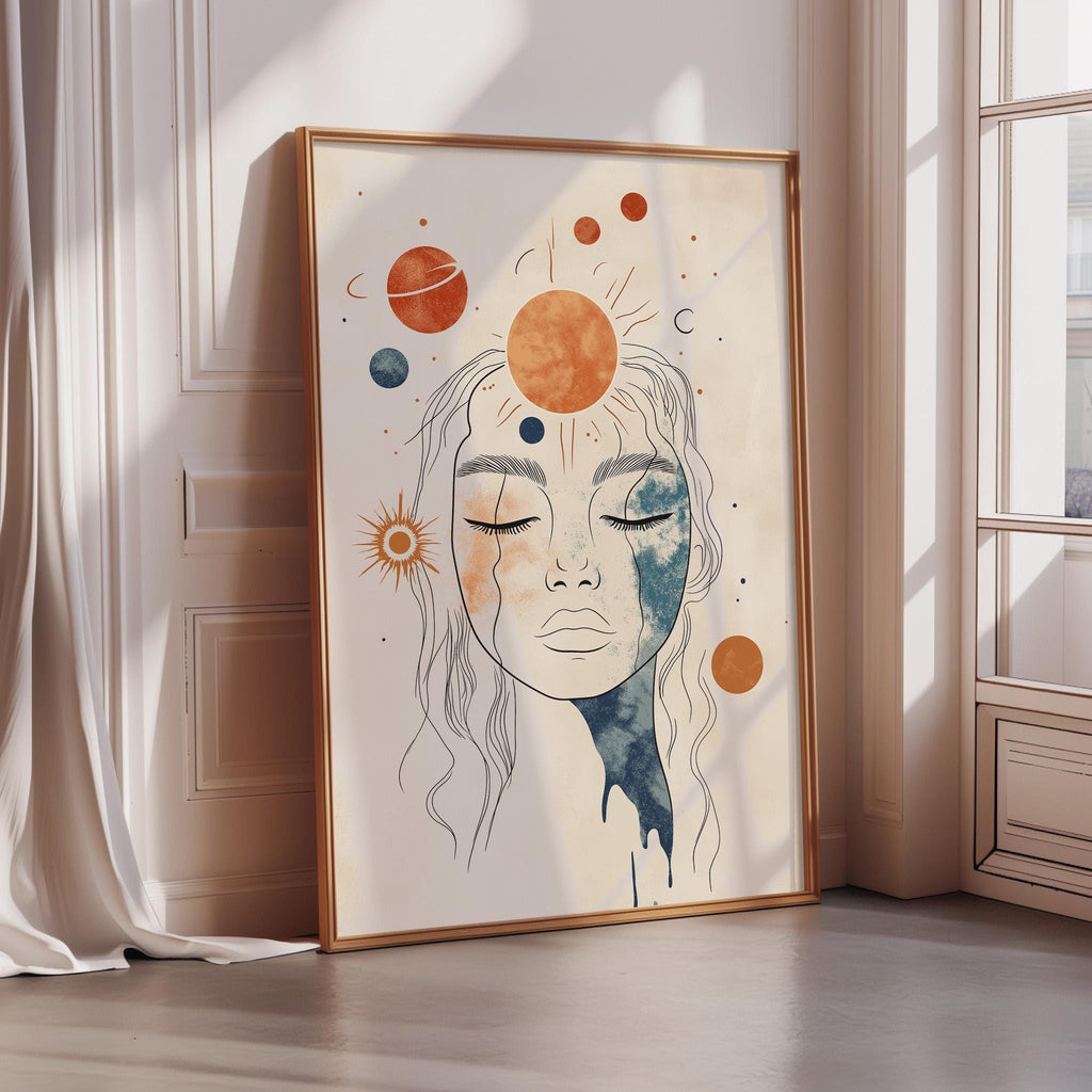 a framed artwork depicting a woman's face with a cosmic theme, including planets and suns.