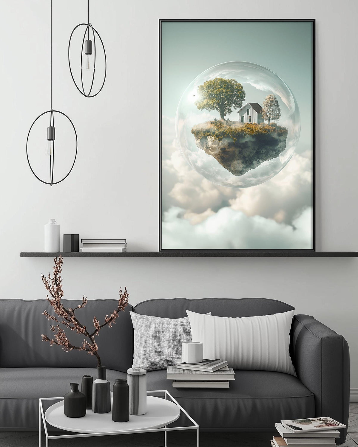 a large, abstract painting of a floating island with a house and trees, surrounded by clouds, hanging on a wall above a gray couch with a coffee table in front of it.