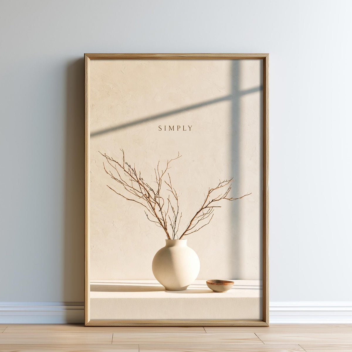a white vase with branches inside, placed on a shelf against a white wall.
