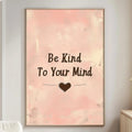 a living room with a large framed poster on the wall that reads "Be Kind To Your Mind" with a heart symbol below the text.