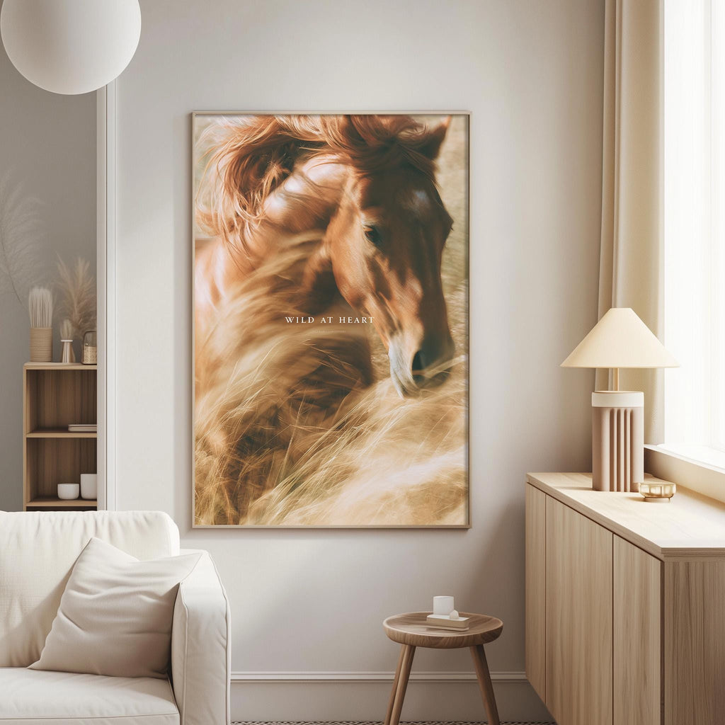 a large framed picture of a horse's face hanging on a wall in a living room.