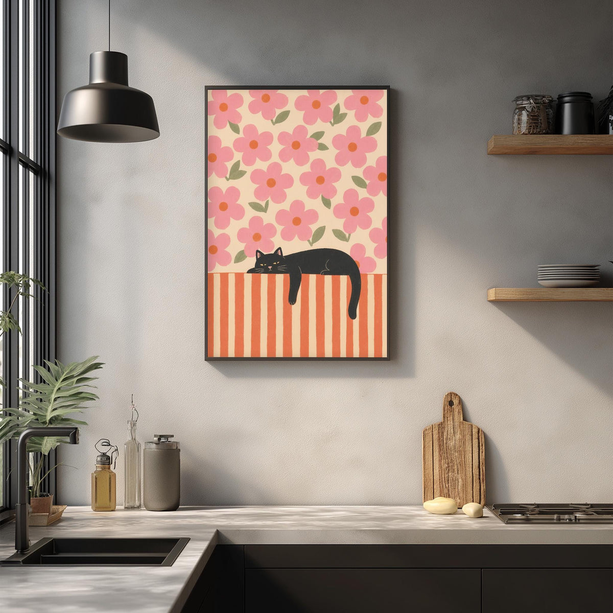 a kitchen scene with a framed picture of a black cat resting on a striped surface, surrounded by various kitchen items such as a cutting board, a bottle, and a vase.