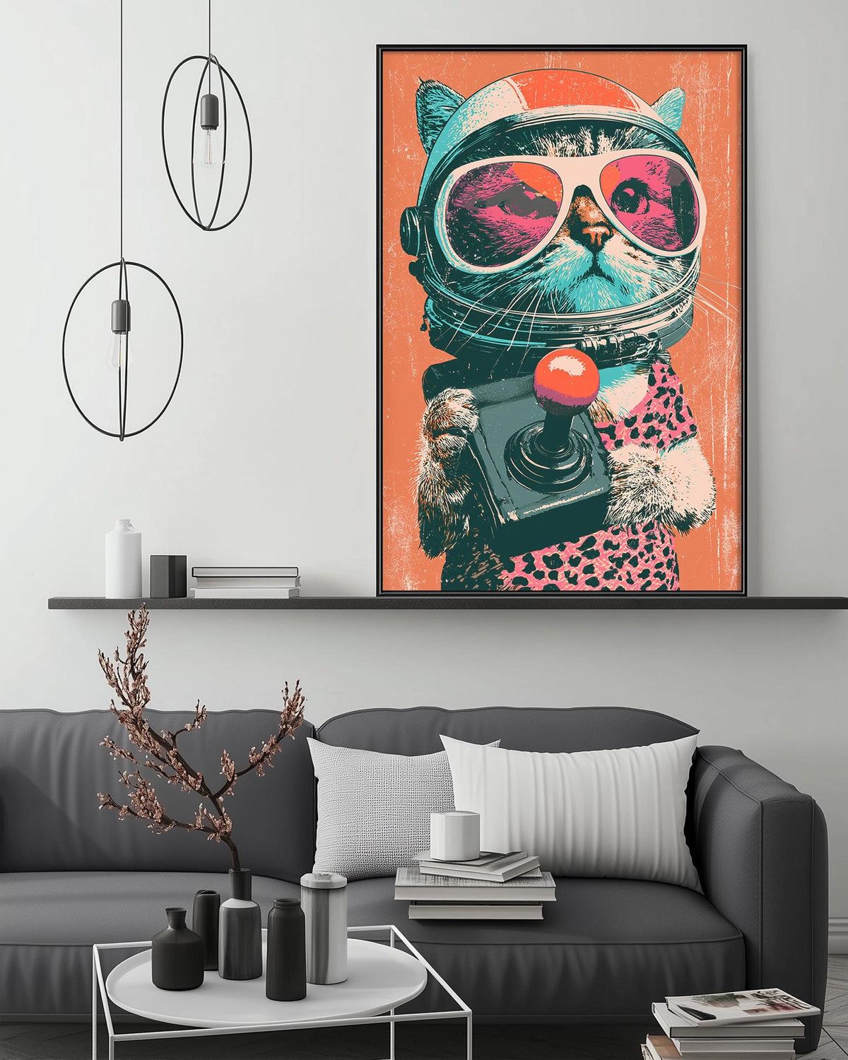 a large, colorful painting of a cat wearing a spacesuit and holding a camera, hanging on a wall above a gray couch in a living room setting.