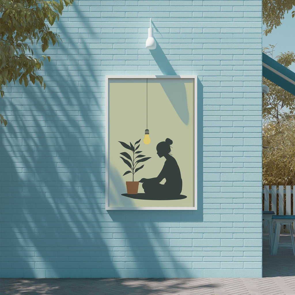 a woman sitting on the ground in front of a potted plant, with a light fixture hanging above her.