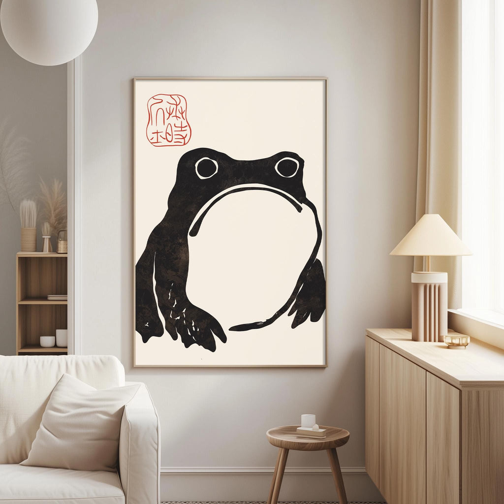a living room with a large framed artwork of a frog on the wall.
