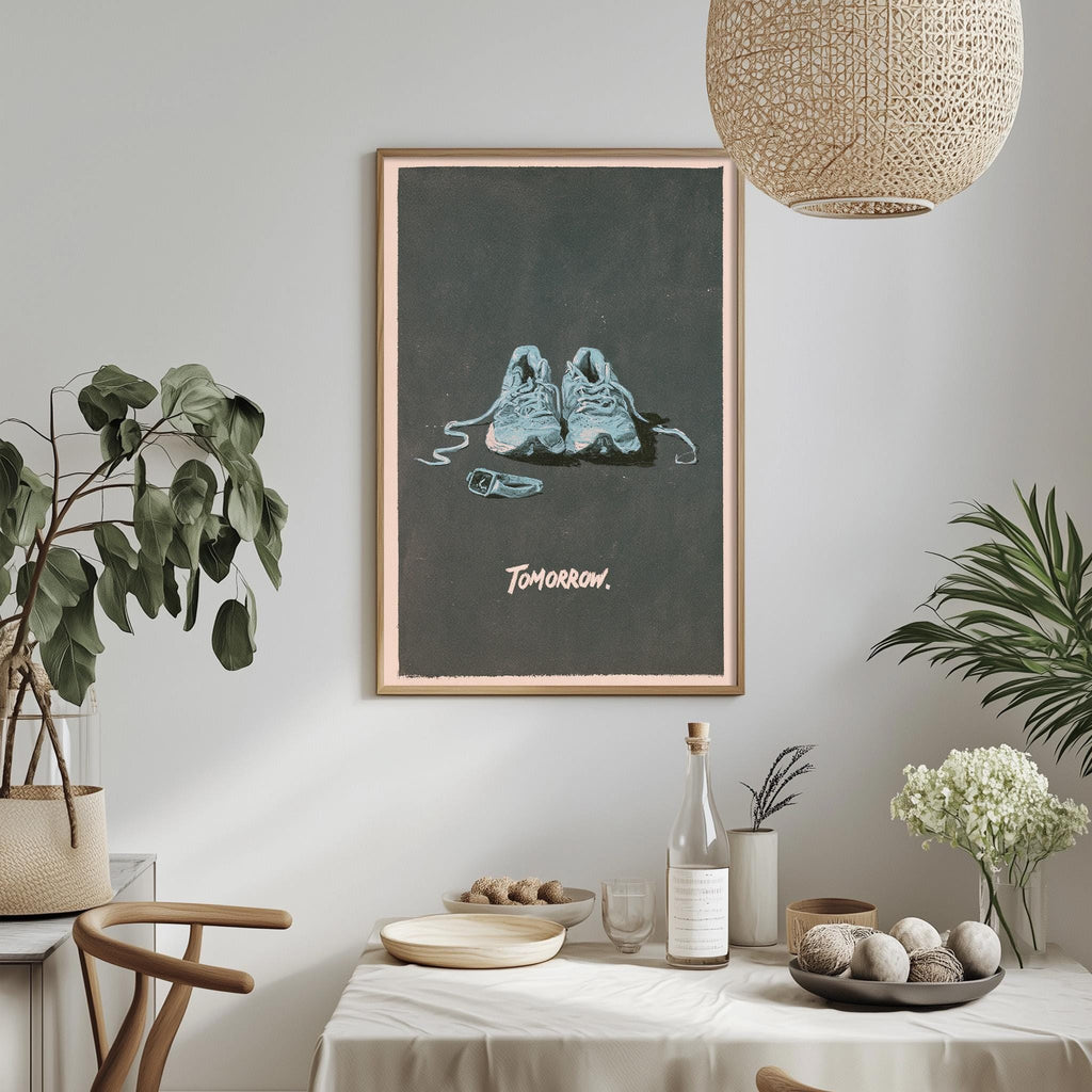 a framed poster of a pair of sneakers on a wall, with the word "tomorrow" written below them. The poster is surrounded by various decorative elements, including potted plants, a dining table with a bowl and a bottle, and a hanging light fixture.