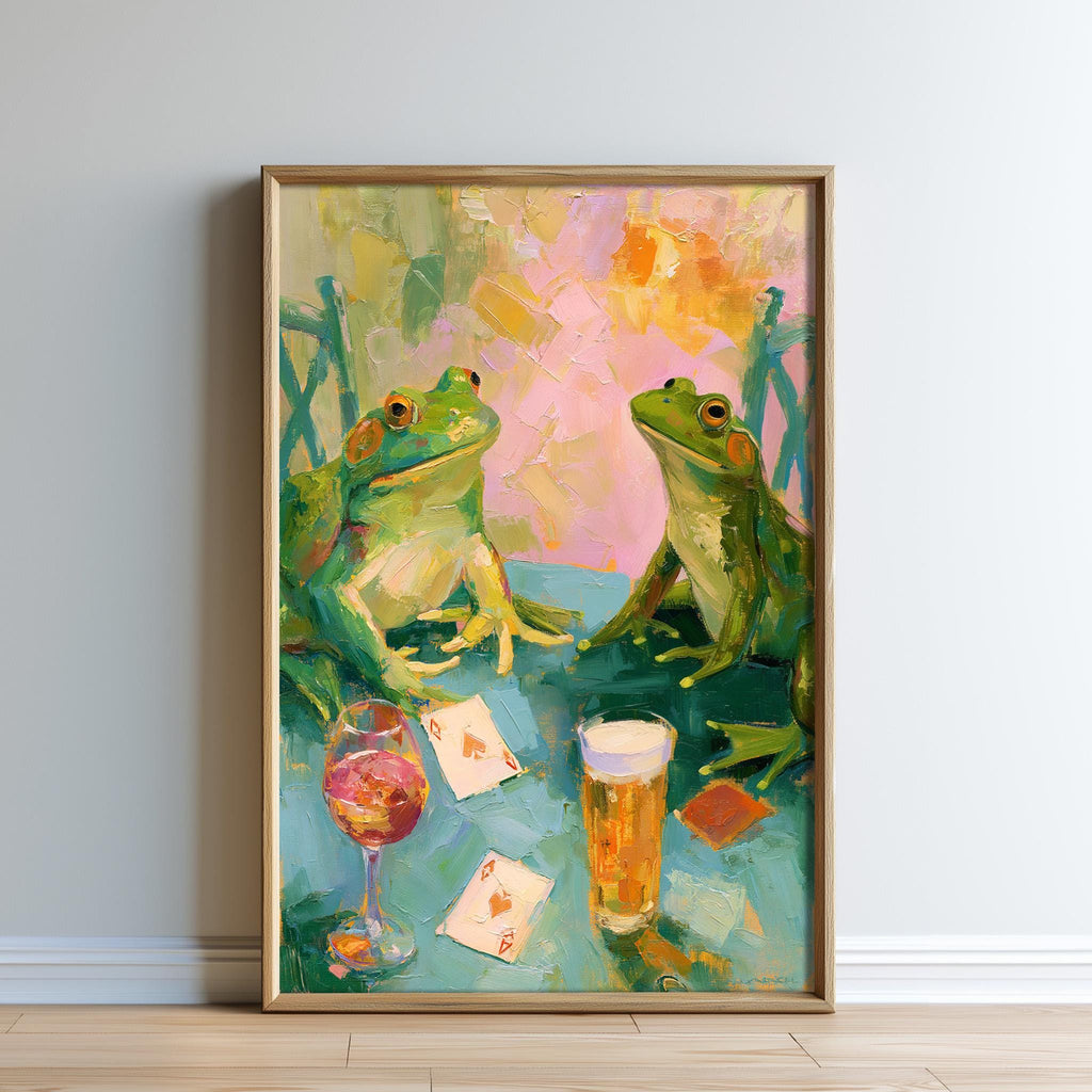 The image is a painting depicting two green frogs sitting at a table with a glass of wine and playing cards.