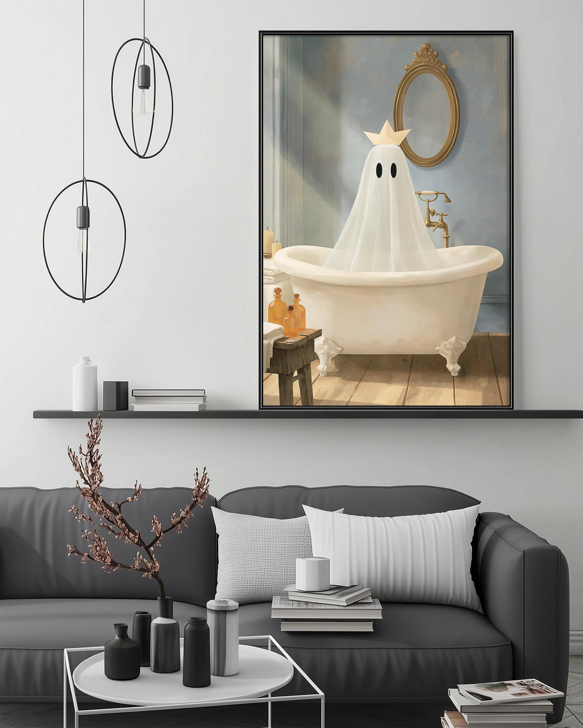a cozy living room with a gray sofa, a coffee table, and a framed painting of a ghost in a bathtub.