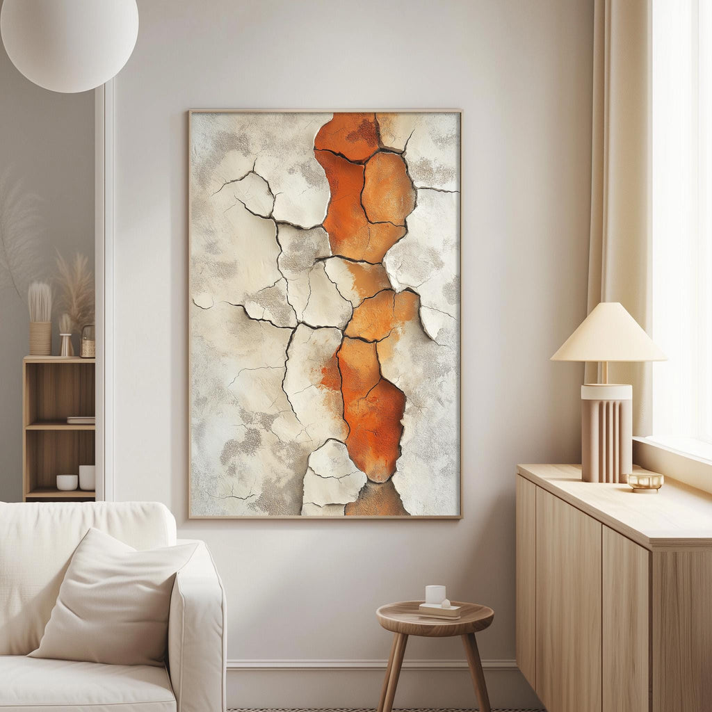 a living room with a large abstract painting hanging on the wall, a white sofa, a wooden side table, and a lamp on a wooden cabinet.