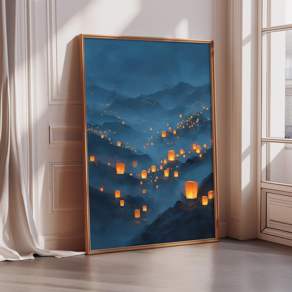 A large framed painting depicting a serene landscape with mountains, clouds, and numerous orange lanterns floating in the sky.