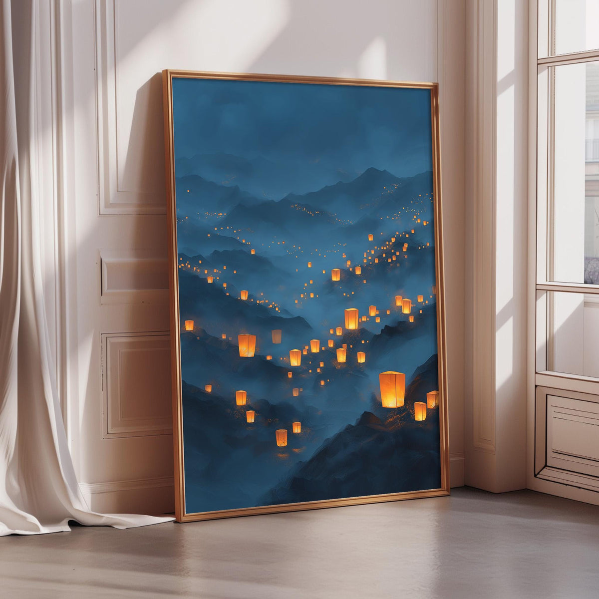 A large framed painting depicting a serene landscape with mountains, clouds, and numerous orange lanterns floating in the sky.