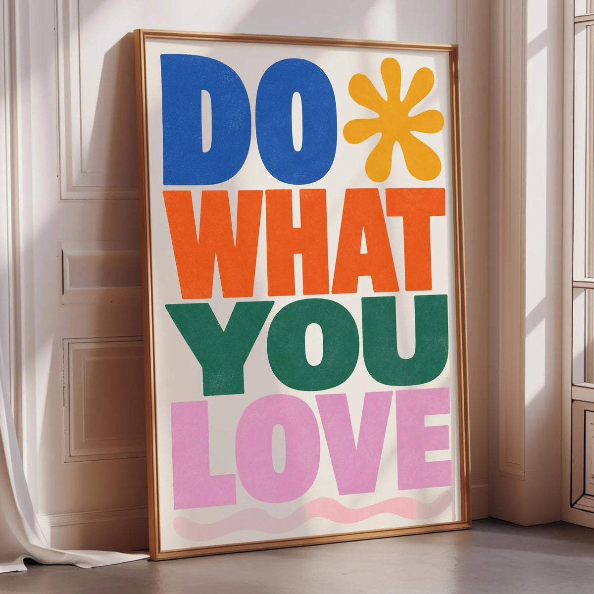 a large, colorful poster with the text "DO WHAT YOU LOVE" displayed prominently.