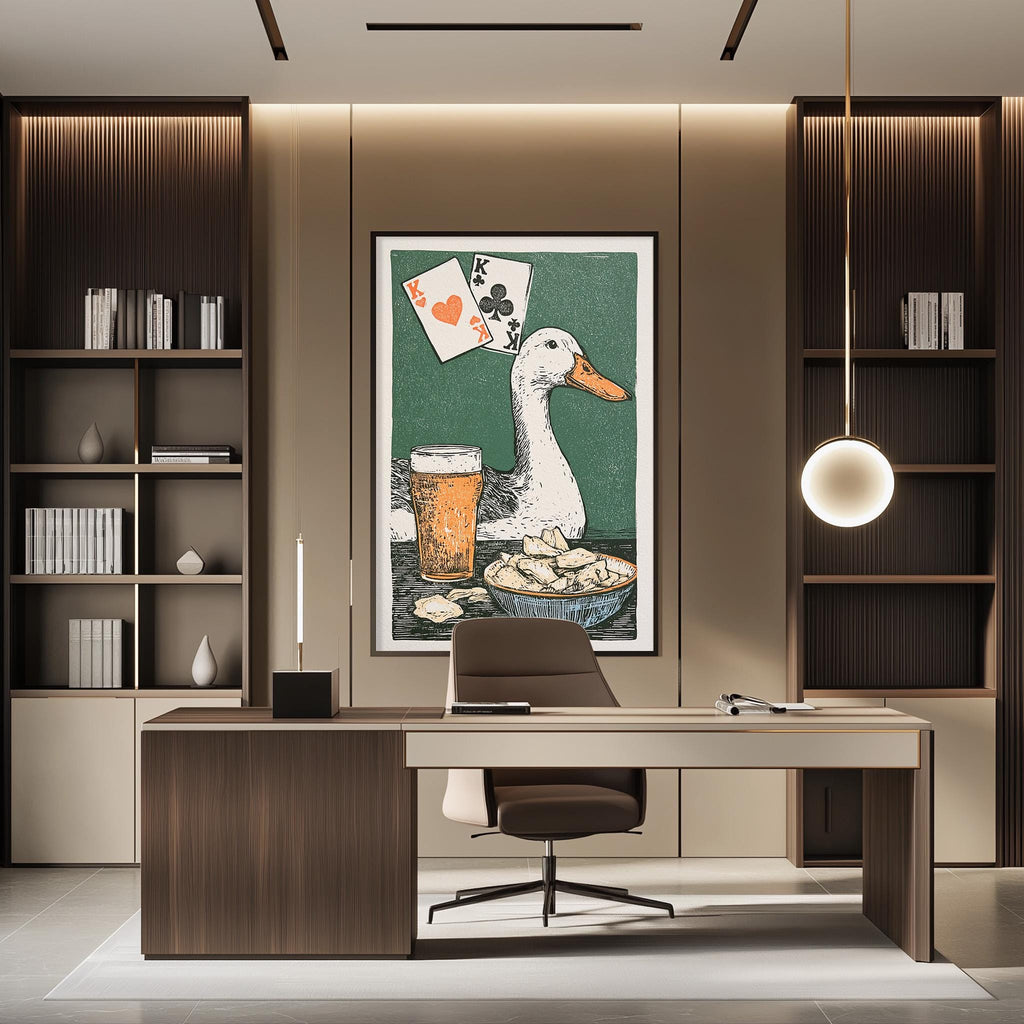 a modern office space with a desk, chair, and a large framed artwork depicting a duck with playing cards on its head.