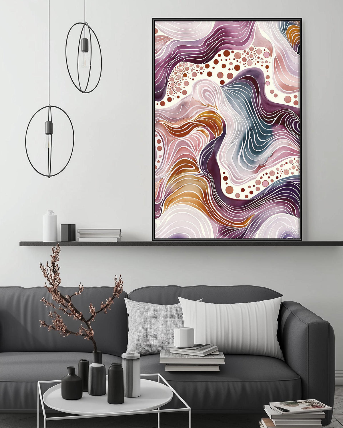a modern living room with a gray sofa, a coffee table, and a large abstract painting hanging on the wall above the sofa.