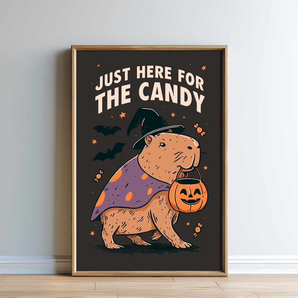 a cartoon illustration of a cute brown animal, possibly a rodent or a small mammal, wearing a witch's hat and carrying a carved pumpkin. The text above the illustration says "Just here for the candy".