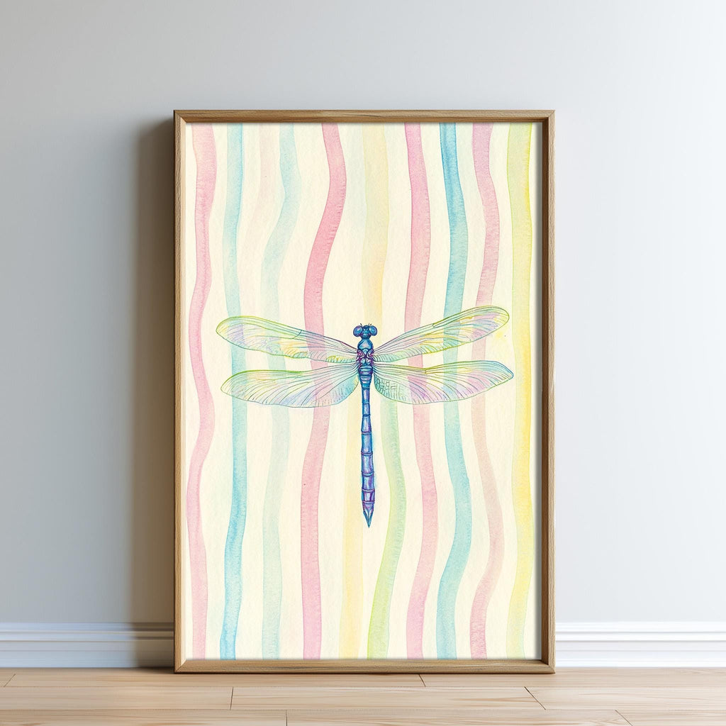 A framed watercolor painting of a dragonfly is displayed on a wall.