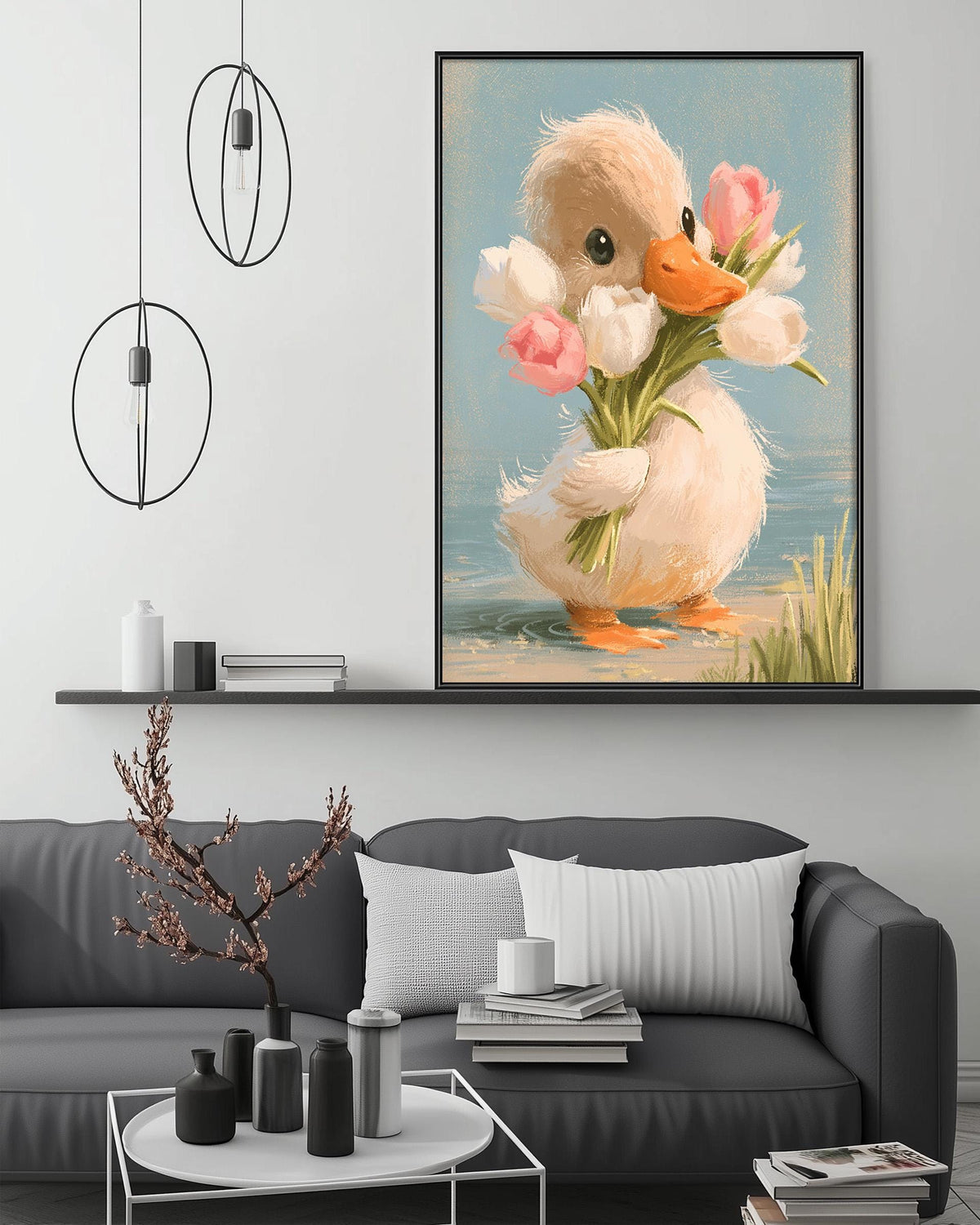 a cozy living room with a gray couch, a coffee table, and a large framed painting of a duck holding a bouquet of flowers hanging on the wall above the couch.