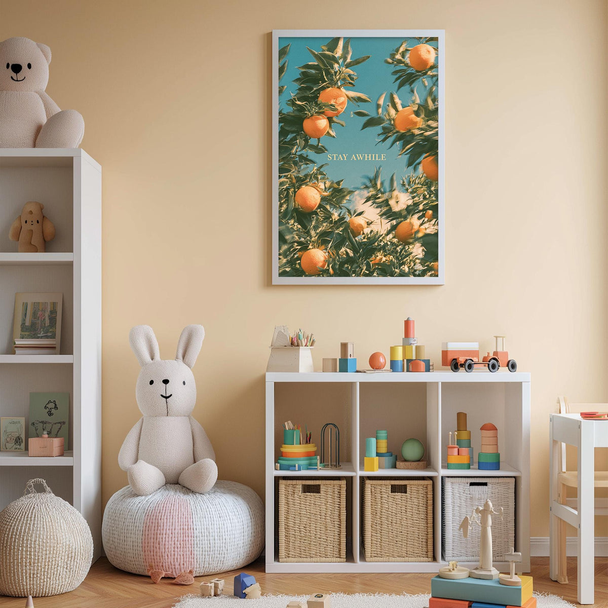 A cozy children's room with a white bookshelf, a plush rabbit, and a colorful toy box filled with toys. A framed poster of an orange tree hangs on the wall, and a shelf holds various toys and books.