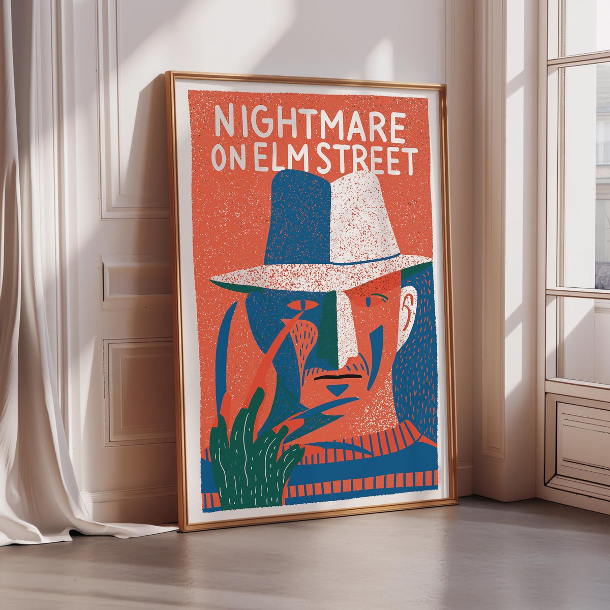 a poster of a man wearing a hat, with the text "NIGHTMARE ON ELM STREET" prominently displayed.