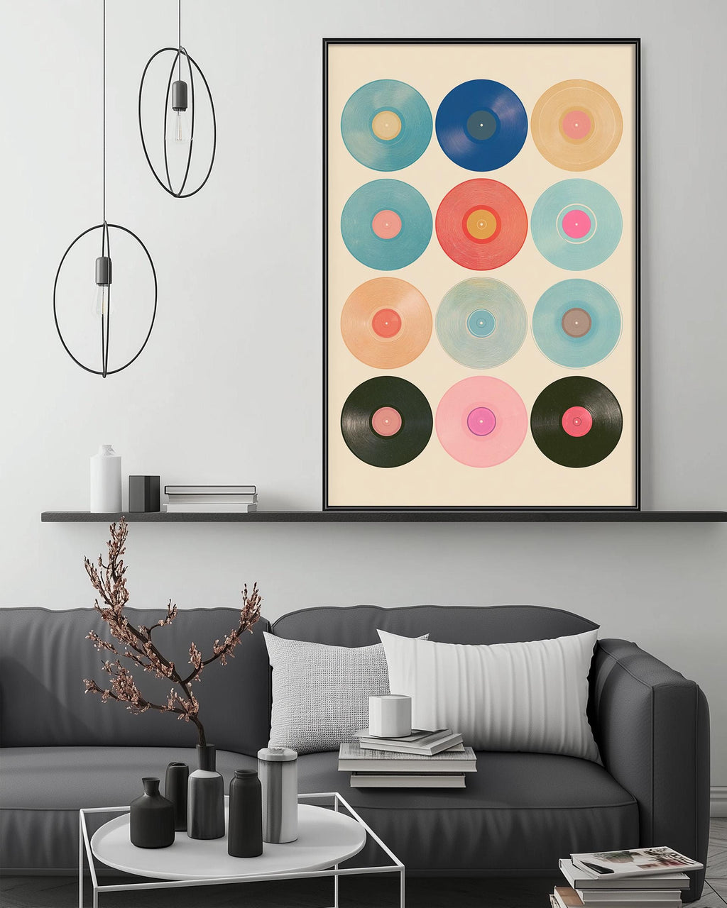 a modern living room with a gray sofa, a coffee table, and a large framed print of colorful vinyl records hanging on the wall above the sofa.