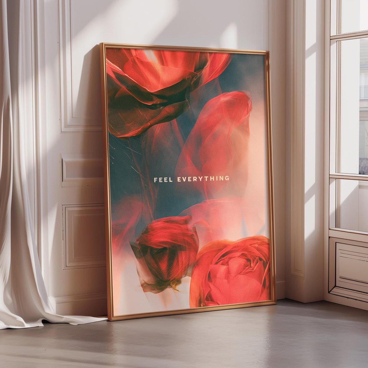 a large framed poster with a vibrant, colorful design of red and green flowers, along with the text "Feel Everything" prominently displayed.