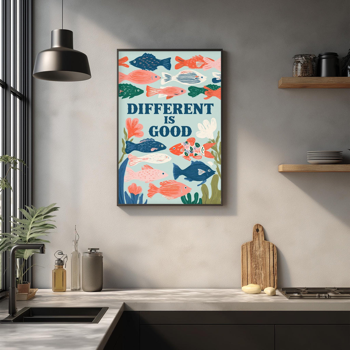 a kitchen counter with a framed poster of colorful fish above it, along with various kitchen items such as a cutting board, a bottle, and a plant.