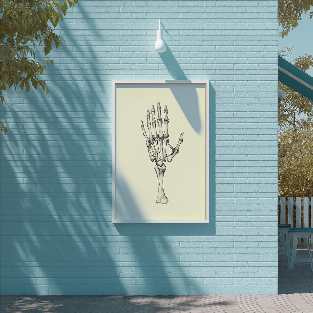 a blue brick wall with a framed illustration of a human hand on it.