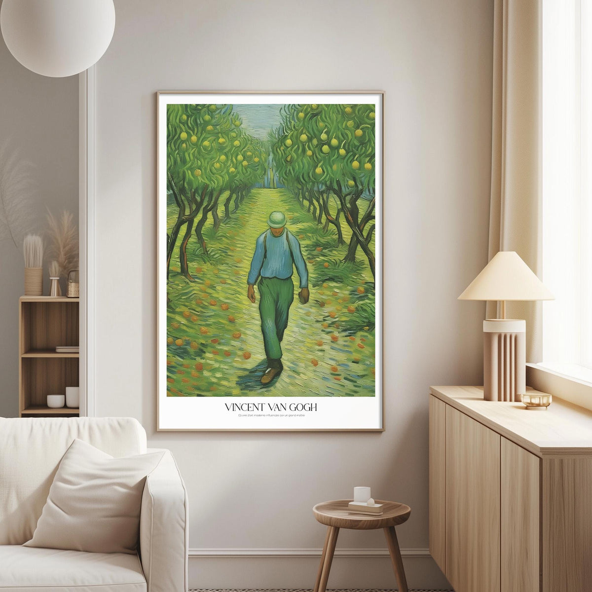 a large painting of a man walking through a lush, green landscape with trees and orange fruit. The painting is hung on a wall in a living room setting, with a white couch and a wooden side table visible in the background.