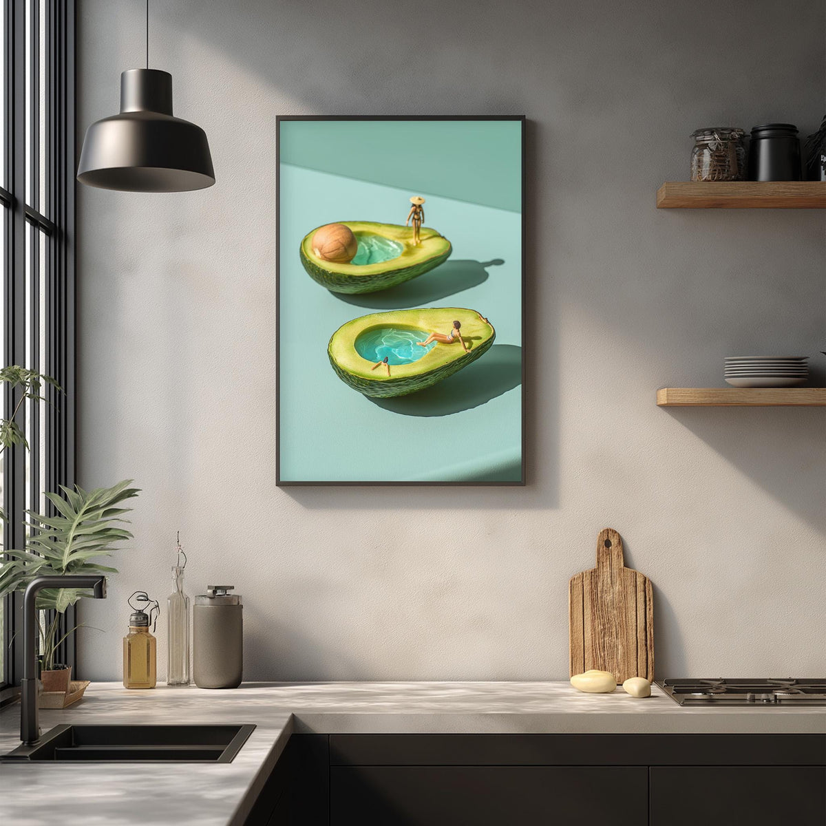 a framed artwork depicting two avocados with miniature figures inside, creating a whimsical and surreal scene.