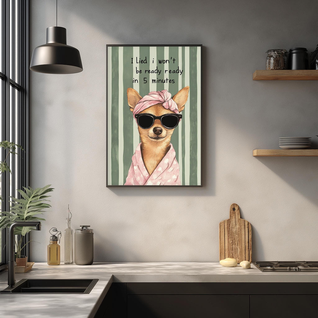 a framed illustration of a dog wearing sunglasses and a pink scarf, with the text "I lie, I won't be ready for lady in 5 minutes" above the dog.