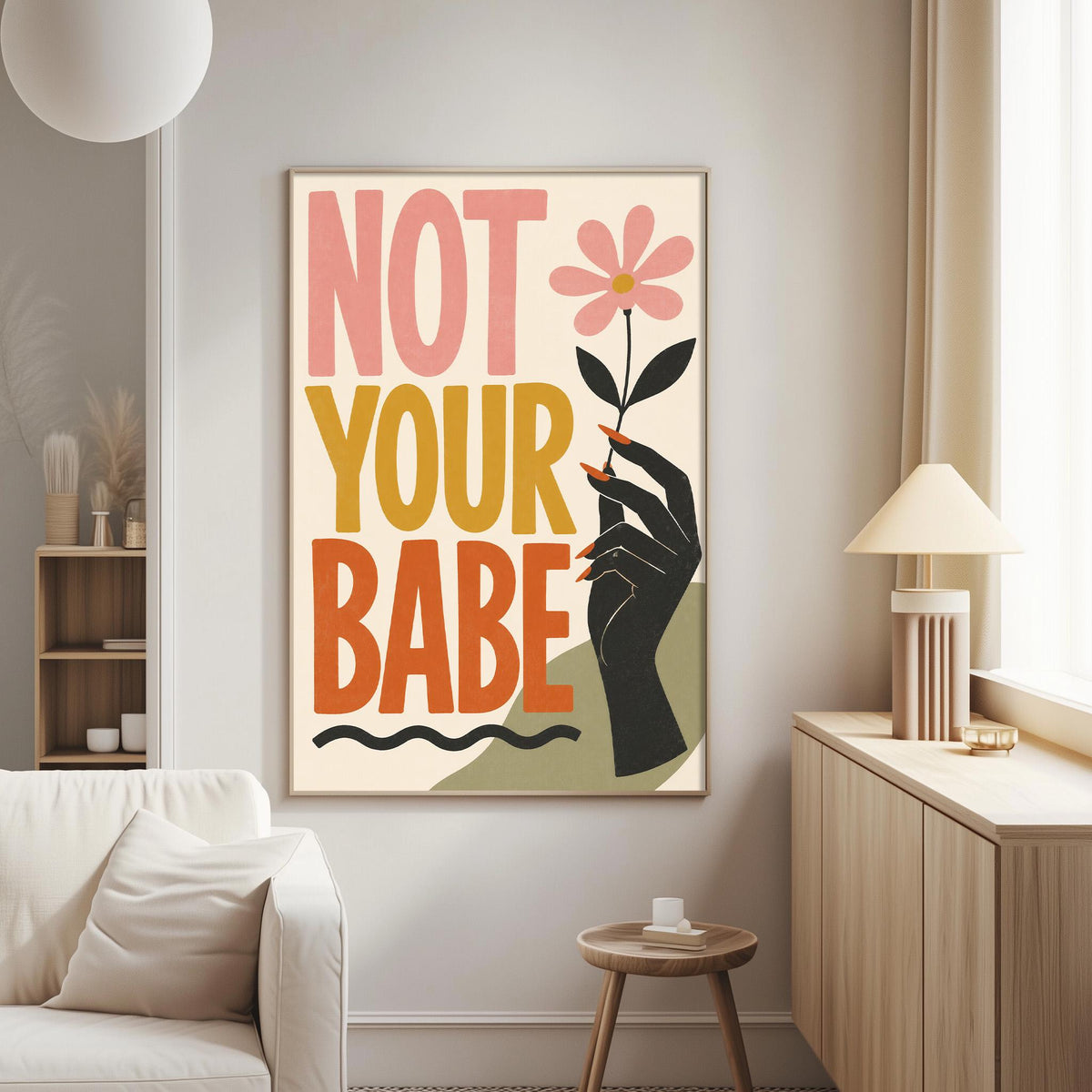 a poster with the text "NOT YOUR BABE" displayed prominently on it.