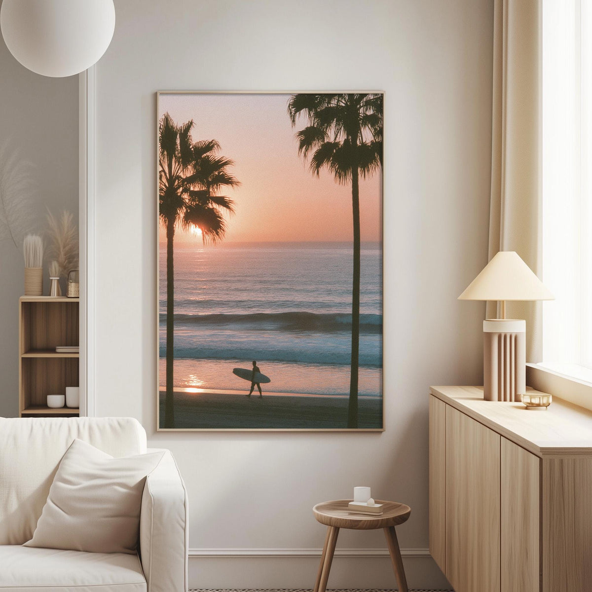 a serene beach scene at sunset, with a silhouetted figure of a person walking along the shoreline.