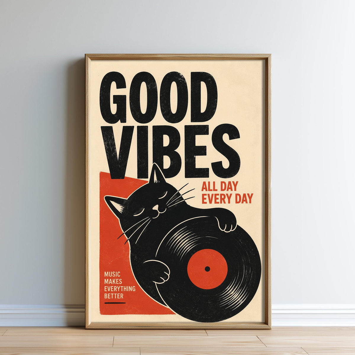 The image is a framed poster with a black cat holding a vinyl record, accompanied by the text "GOOD VIBES ALL DAY EVERY DAY" and "MUSIC MAKES EVERYTHING BETTER".