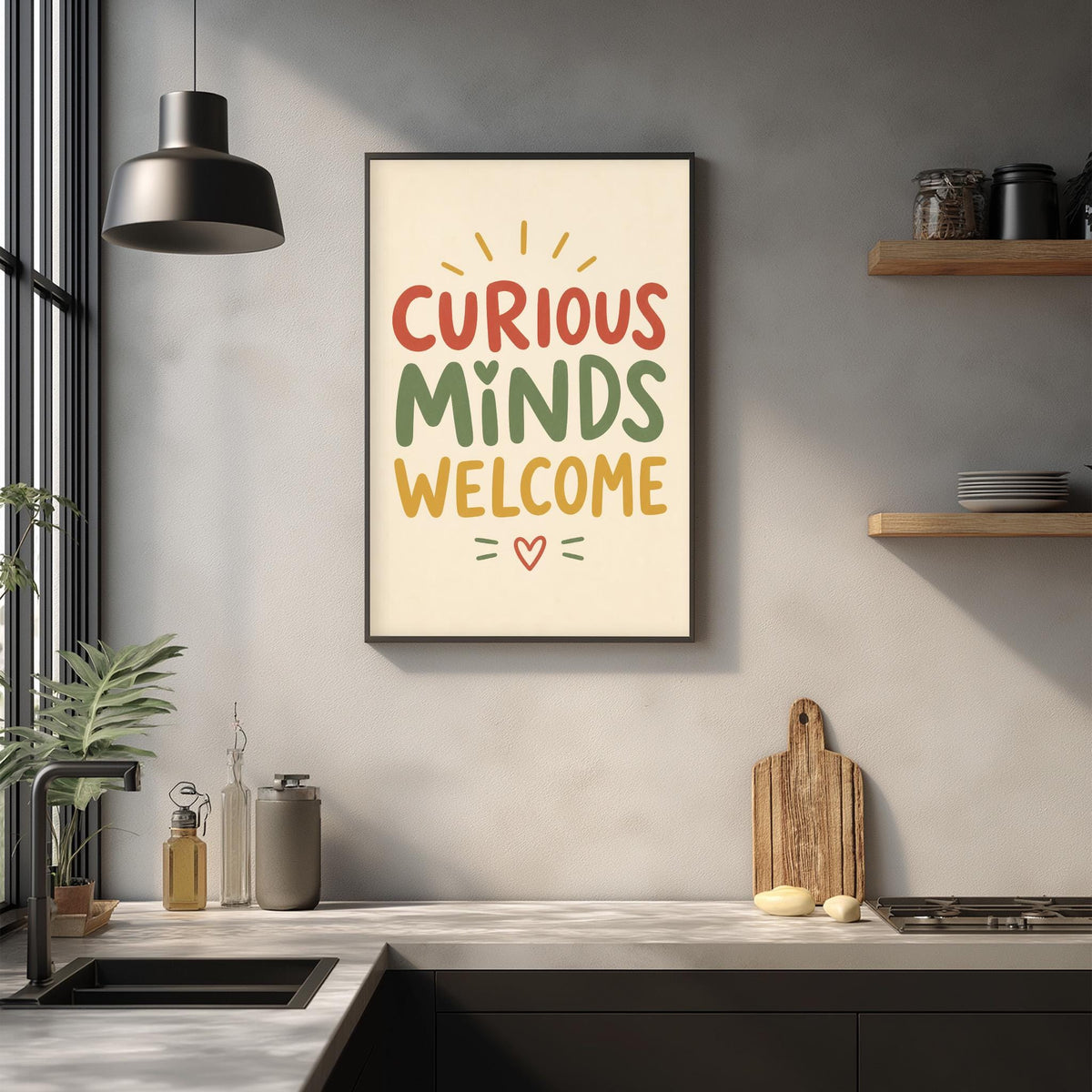 a kitchen counter with a framed poster that reads "CURIOUS MINDS WELCOME" above it. The poster is surrounded by various kitchen items, such as a cutting board, a bottle, and a jar.