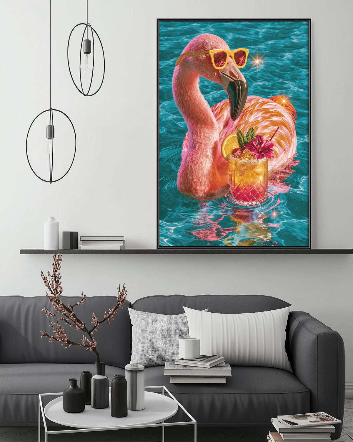 a large framed picture of a pink flamingo floating in a pool, wearing sunglasses and holding a drink. The flamingo is surrounded by a blue and green water background, creating a vibrant and whimsical scene.