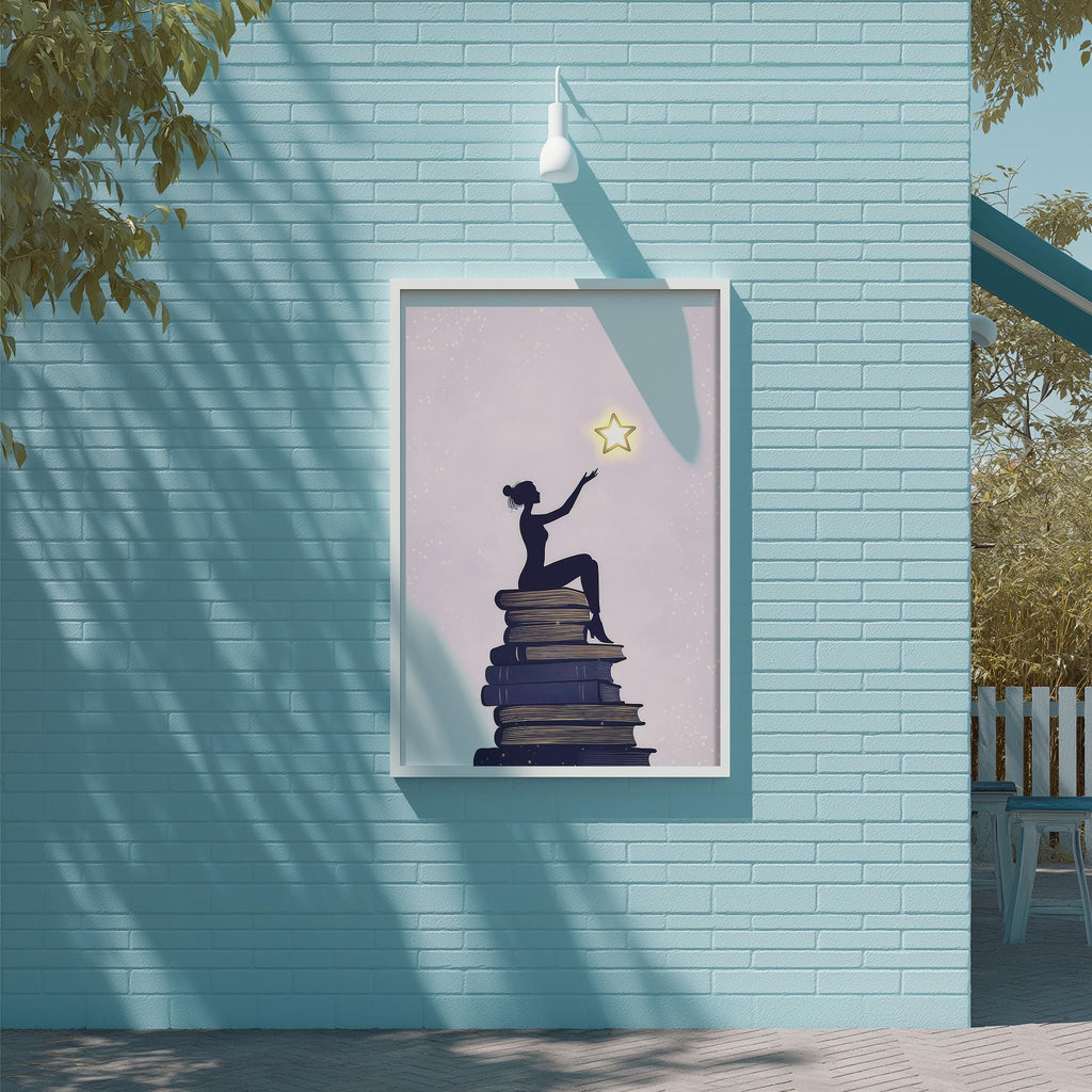 A framed illustration of a woman sitting on a stack of books, with a star above her, is displayed on a blue brick wall.