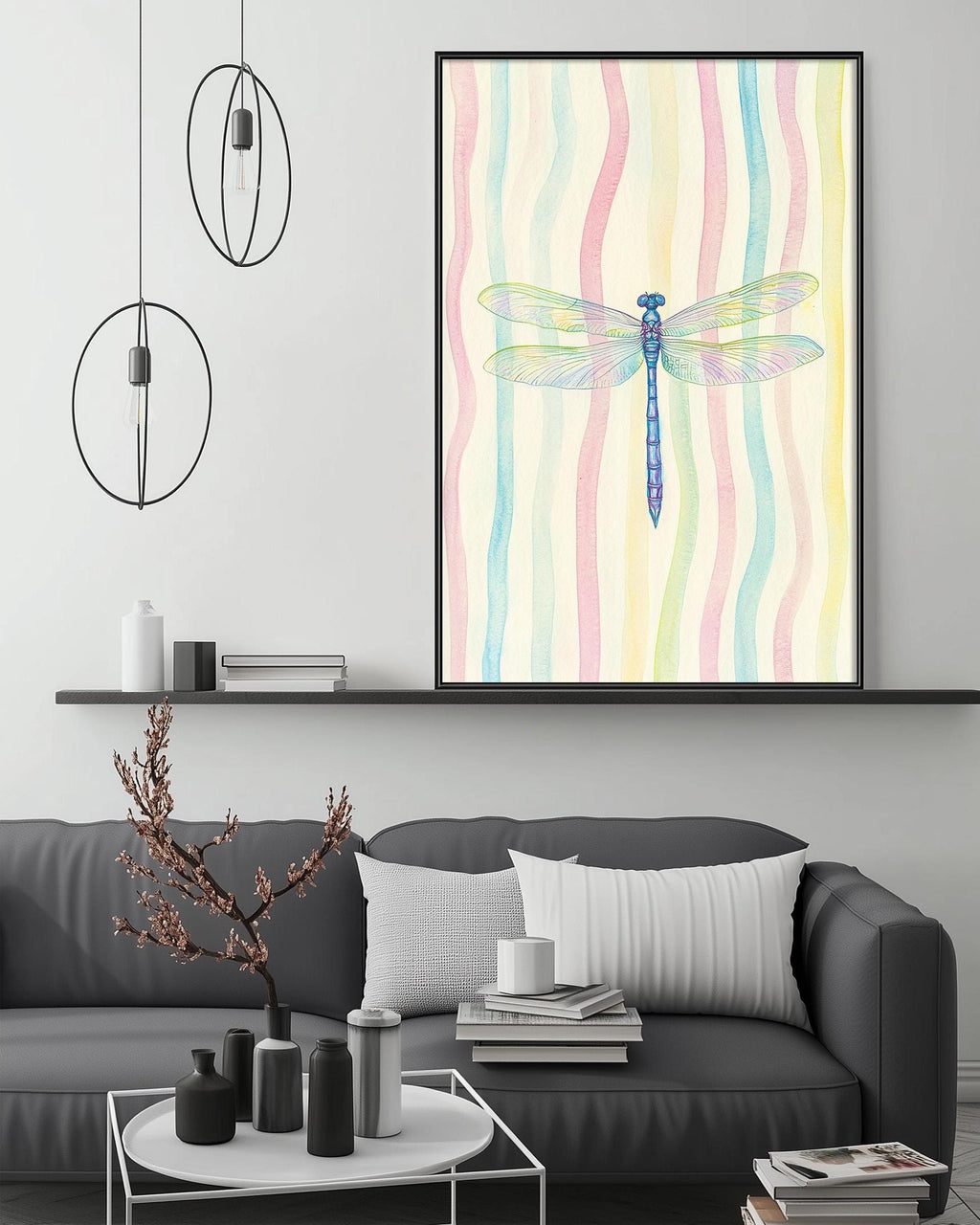 a modern living room with a gray sofa, a coffee table, and a large framed picture of a colorful dragonfly hanging on the wall above the sofa.