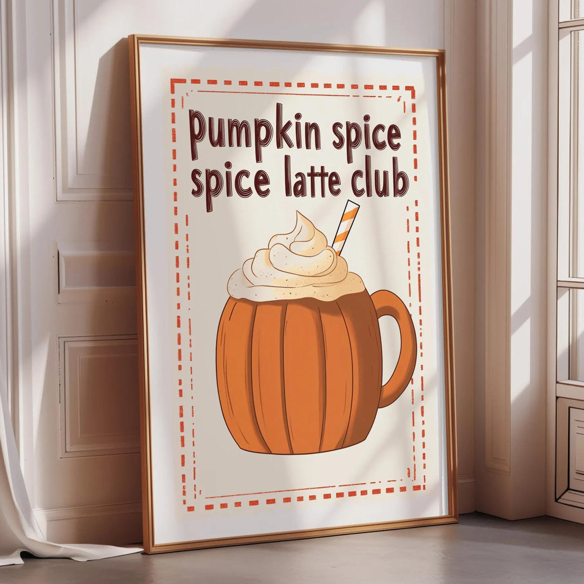 A framed poster advertising a pumpkin spice latte club, featuring an illustration of a pumpkin spice latte with whipped cream and a straw.