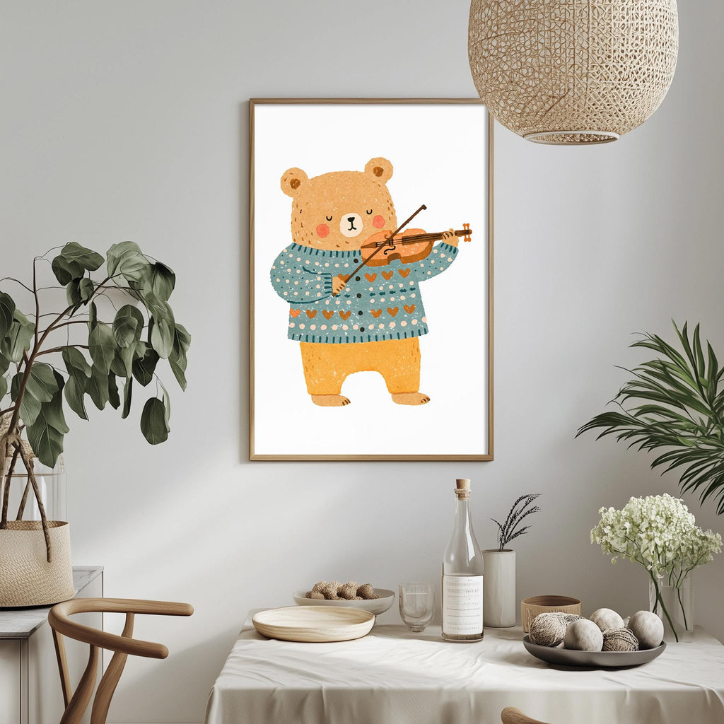 a framed illustration of a bear playing a violin, hanging on a wall above a dining table with various decorative items and plants.