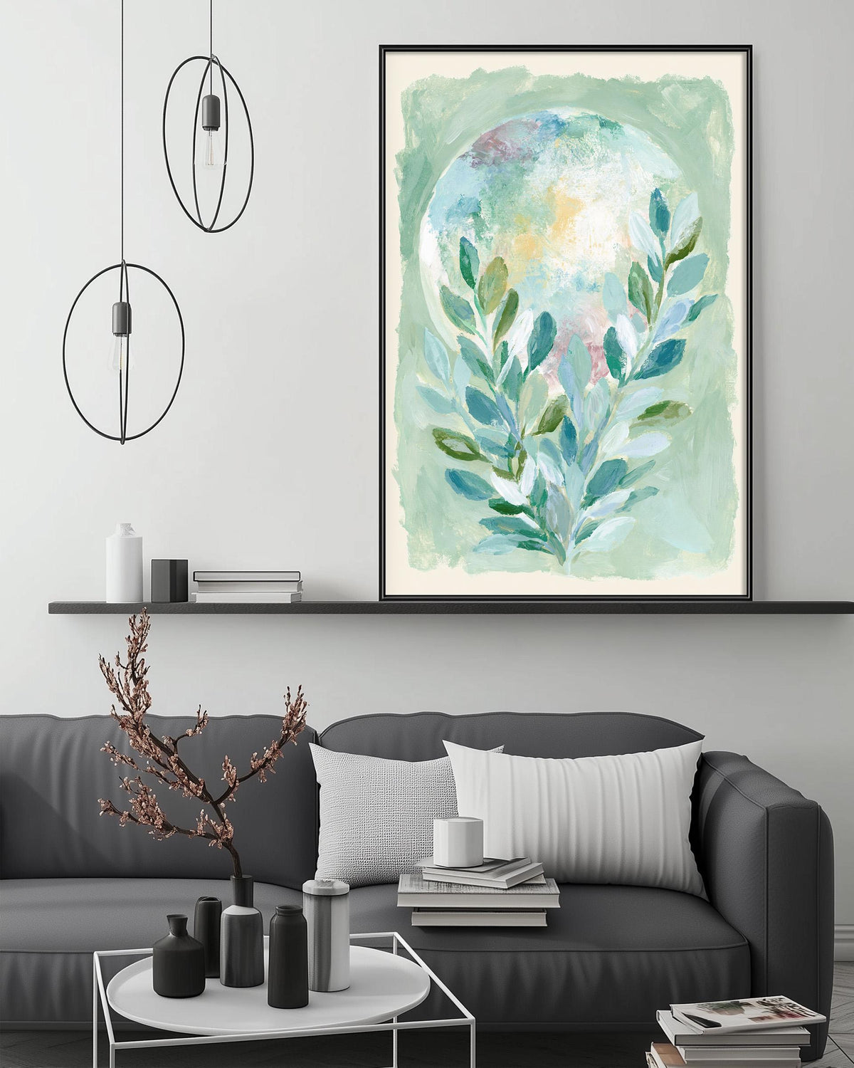 a modern living room with a gray sofa, a coffee table, and a large painting of a plant on the wall above the sofa.