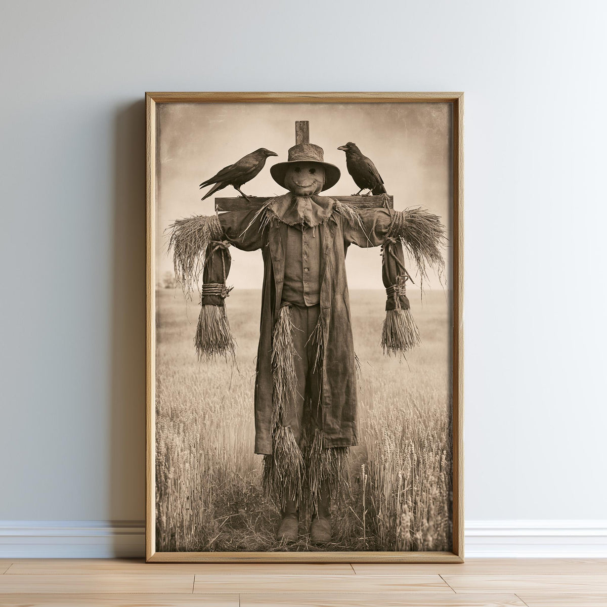 A black and white photograph of a scarecrow standing in a field, with two birds perched on its back.