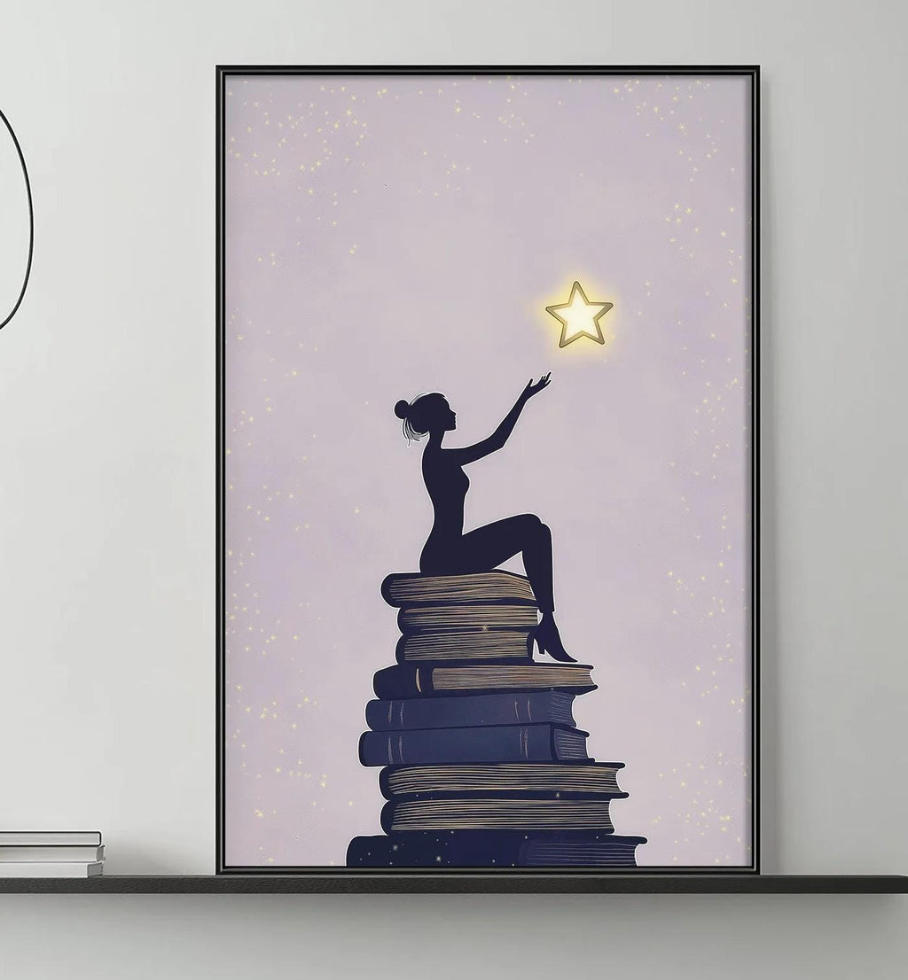 a cozy living room with a gray sofa, a coffee table, and a large framed poster of a woman sitting on a stack of books with a star above her.
