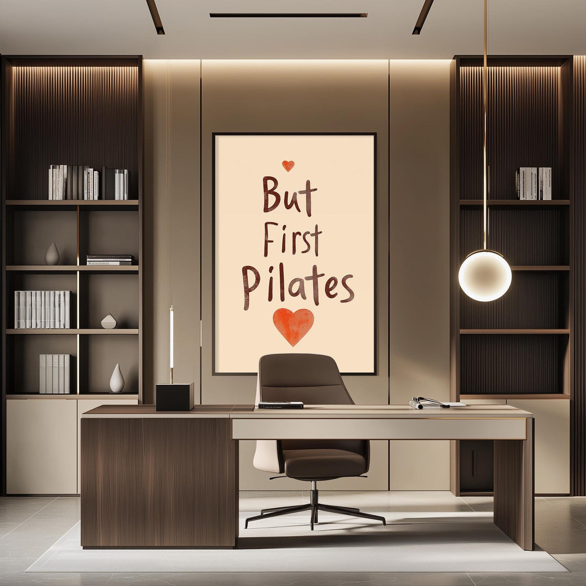 A modern office space with a desk, chair, and bookshelves. A large poster on the wall says "But First Pilates" with a heart symbol.