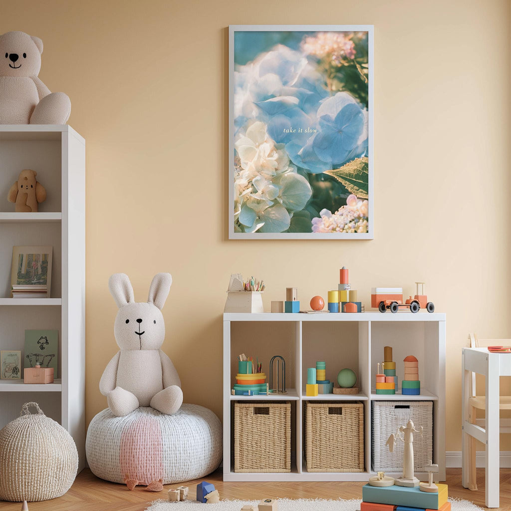 A cozy and colorful children's bedroom with a large stuffed bunny, a bookshelf, and a toy storage unit filled with toys and books.