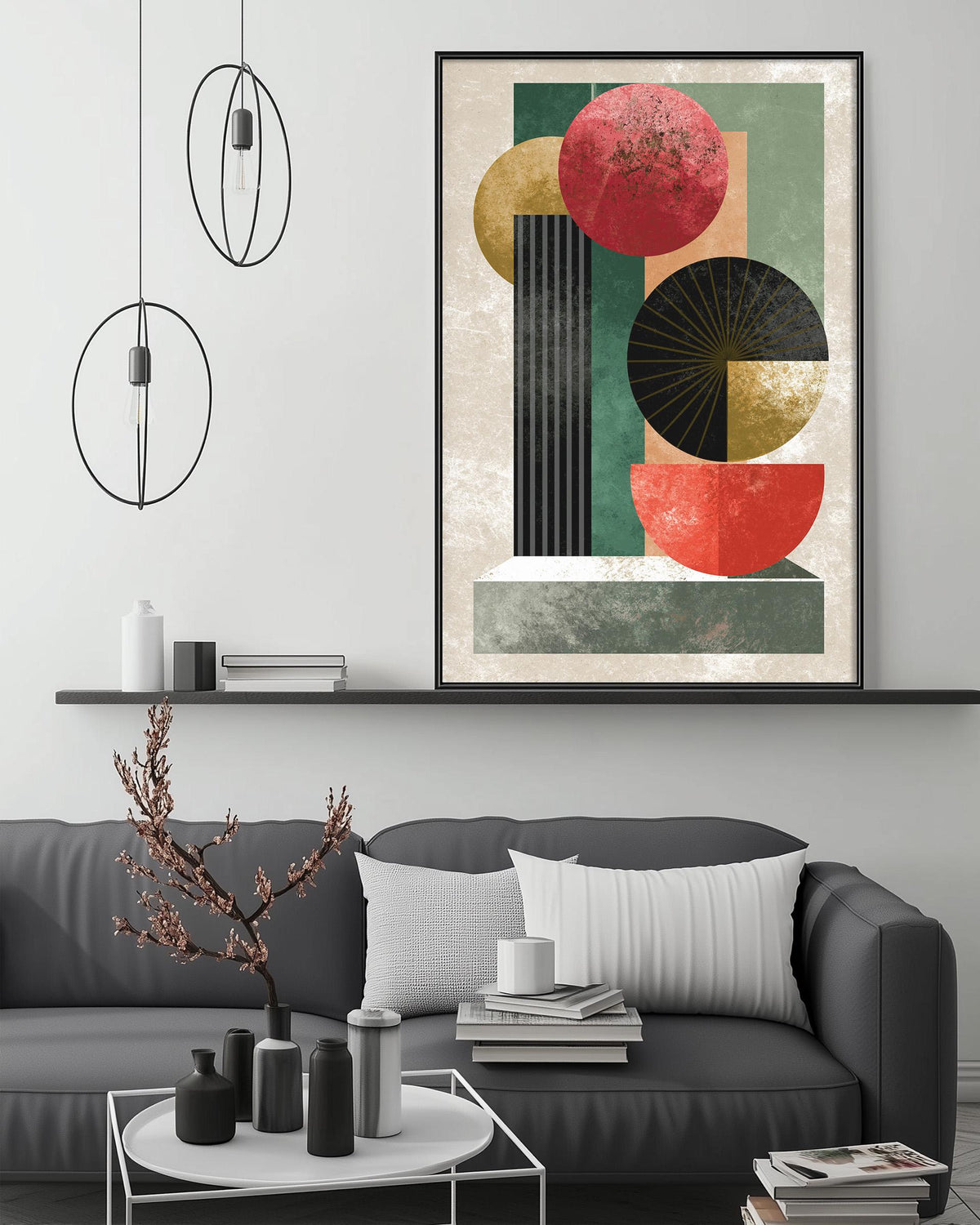 a modern living room with a gray sofa, a coffee table, and a large abstract painting hanging on the wall above the sofa.